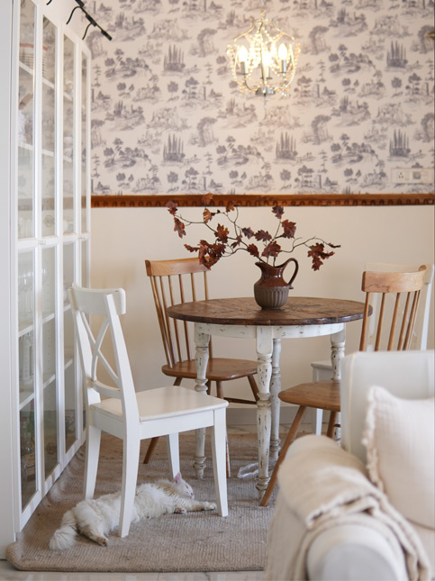 Spindle Chairs and Rustic Blooms - Beautiful Homes