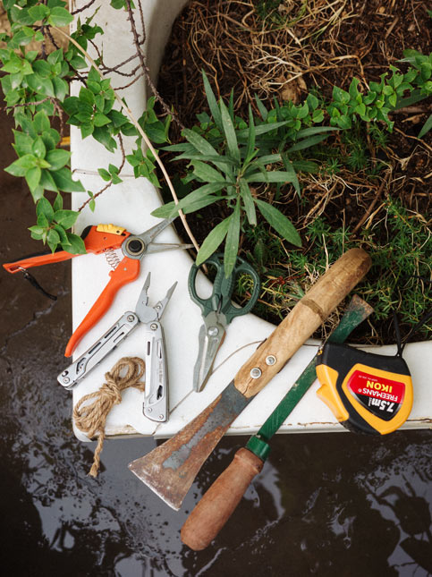 Tools of the gardener from pruning scissors to a tape and some spades - Beautiful Homes