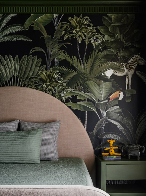 Whimsical jungle-themed bedroom with dark wallpaper, forest green accents, and soft curves, blending a moody aesthetic – Beautiful Homes