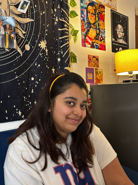 Cozy living room with eclectic wall art, celestial tapestry, and warm ambient lighting – Beautiful Homes