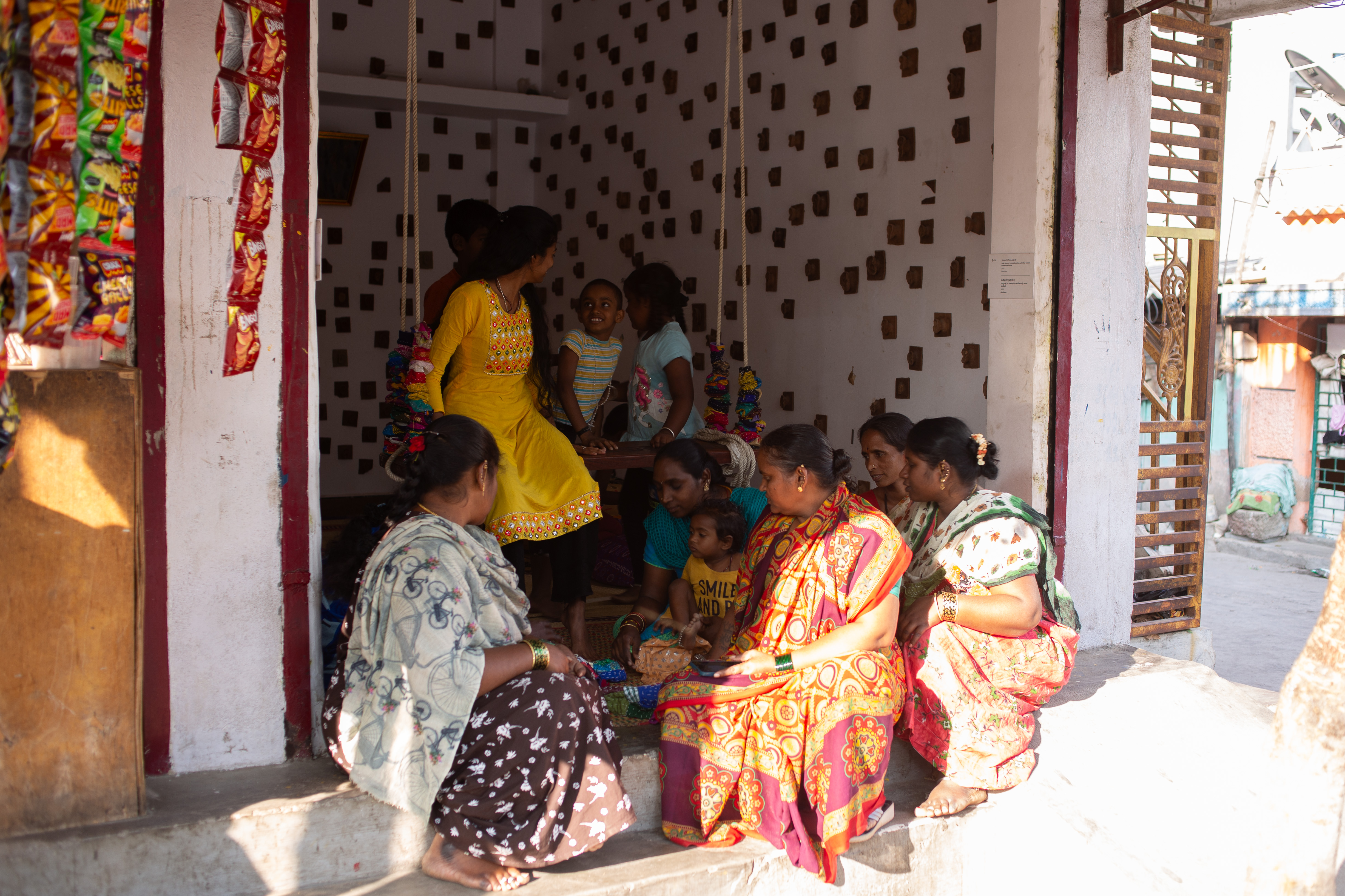 Women gathering at a community space in Namma Katte – Beautiful Homes