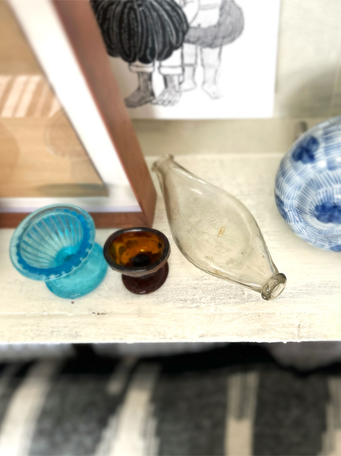 Vintage Glassware Arrangement on Wooden Shelf - Beautiful Homes