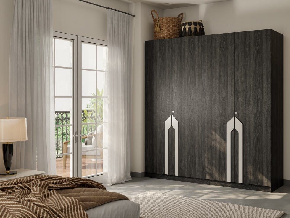 Bedroom featuring a dark wood wardrobe, large mirror, balcony access, and natural lighting – Asian Paints