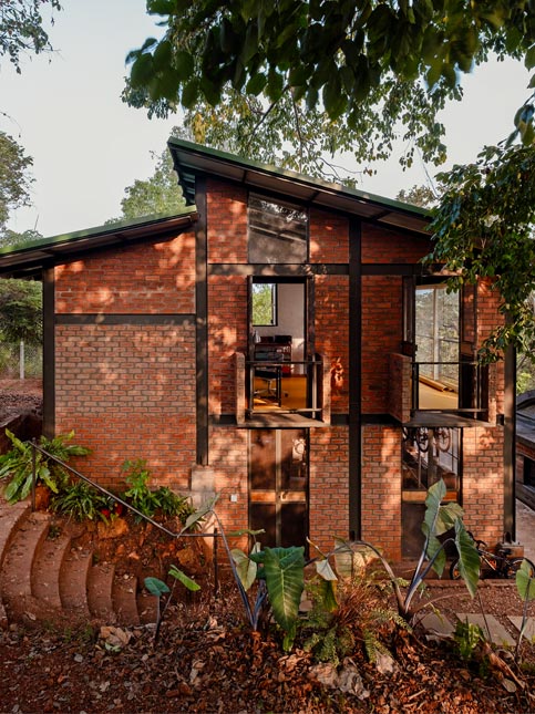 The light-filled, split-level studio and workshop peers over the treetops and tidal backwaters of Olaulim – a serene perch for Freehand Studio’s creative process – Beautiful Homes