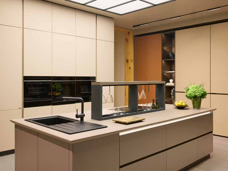 Luma Noir kitchen with extendable island countertop for seamless prep – Beautiful Homes