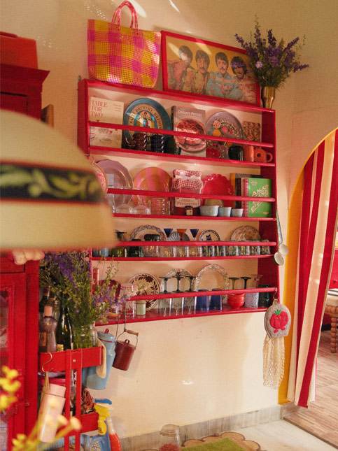 Mehek’s kitchen with open red shelves and crockery – Beautiful Homes