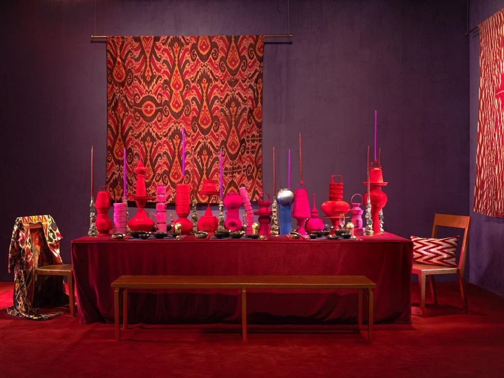 Vivid Dream by Eeshaan Kashyap is a lush tablescape saturated in red and features sculptural pieces in velvet, pyrite candlestands, and ikat fabric to create a vivid tableau – Beautiful Homes