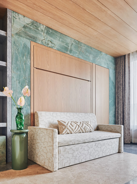 Modern foldable wall bed with sofa in compact bedroom design – Beautiful Homes