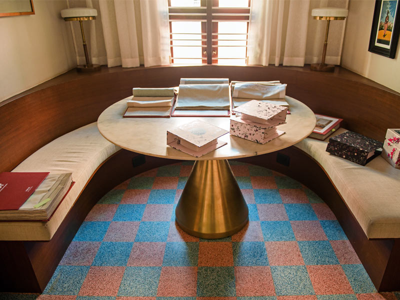 Curved seating with round table setup – Beautiful Homes