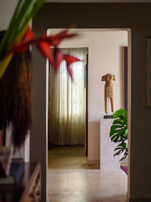 Hallway with art sculpture display – Beautiful Homes