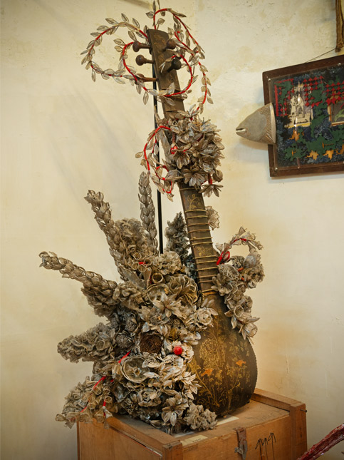 Khyal sculpture transforming a sitar into metal blooms - Beautiful Homes