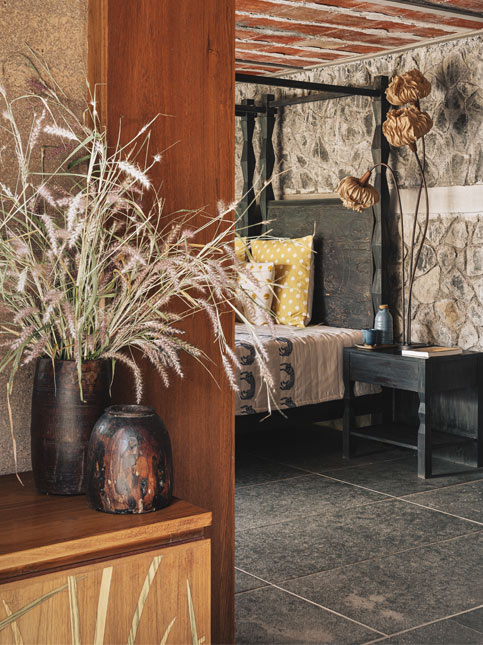 Stone lattice wall filtering light and cooling air – Beautiful Homes