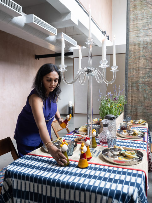 Reddy balances the table with low greens and a single tall candle stand, keeping sightlines clear and embracing the gentle asymmetry she prefers – Beautiful Homes