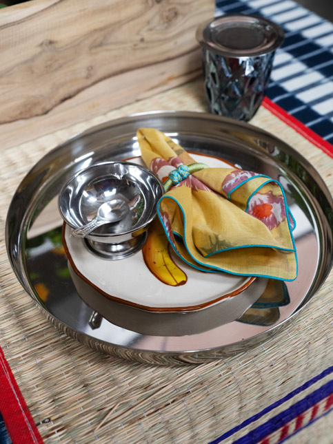 Steel forms the base of the setting, allowing textiles and colour to unfold around it – Beautiful Homes