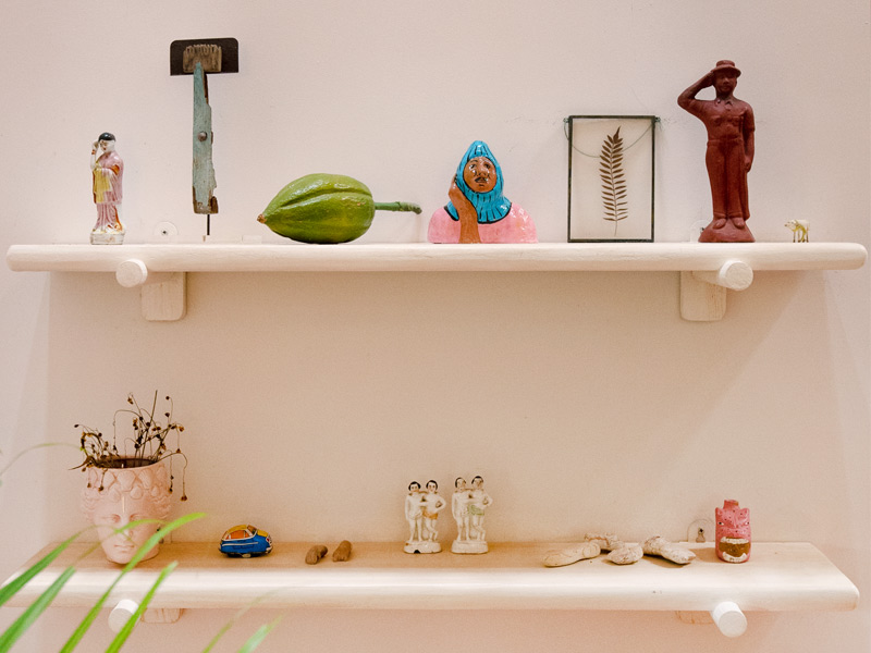 Wooden shelves with quirky décor items – Beautiful Homes