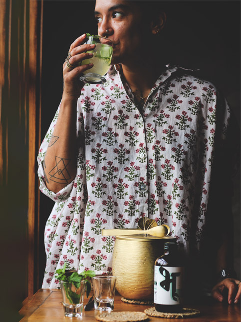 Person drinking a botanical beverage – Beautiful Homes