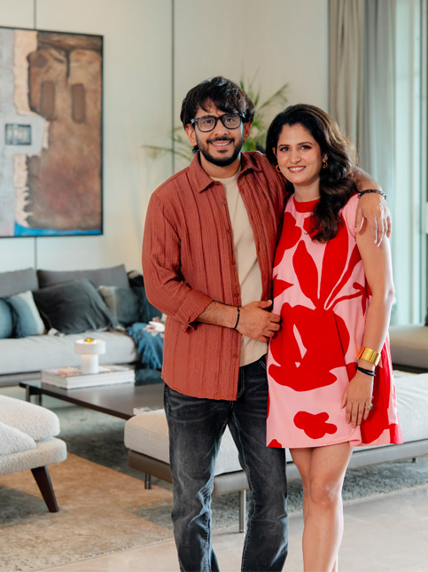 Aman and Priya Gupta standing in a modern living room – Beautiful Homes