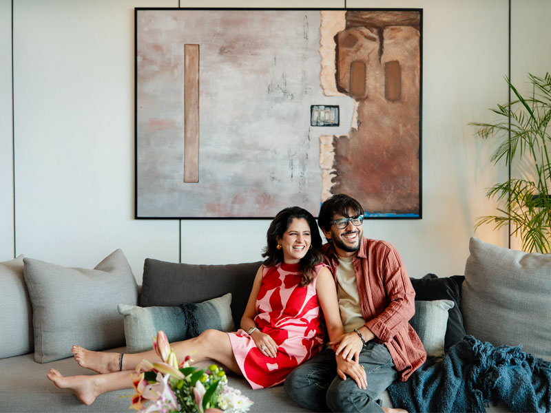 Aman and Priya Gupta relaxing in living room – Beautiful Homes