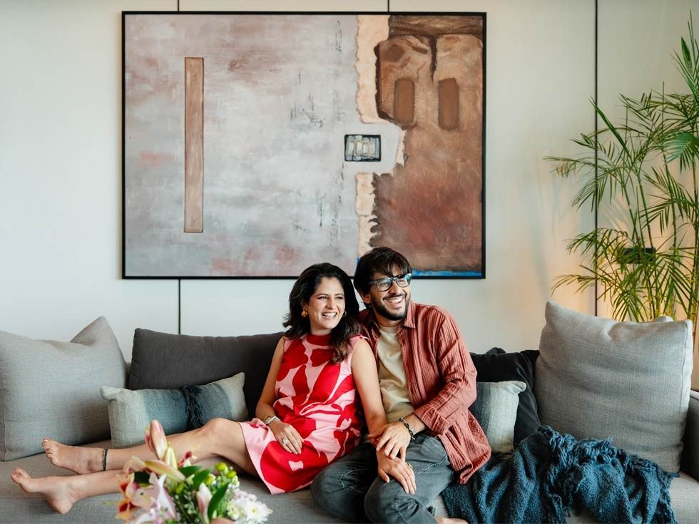 Aman and Priya Gupta relaxing in living room – Beautiful Homes