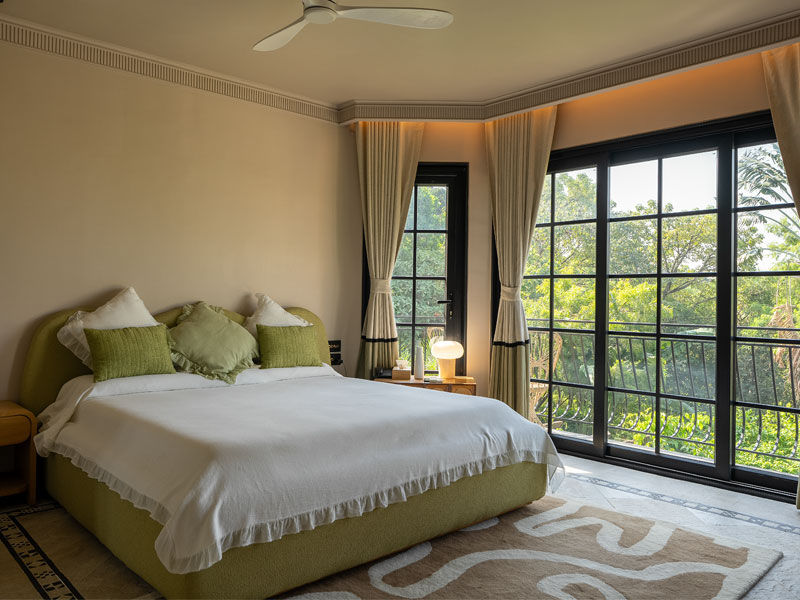 Bedroom with muted walls and natural light – Beautiful Homes