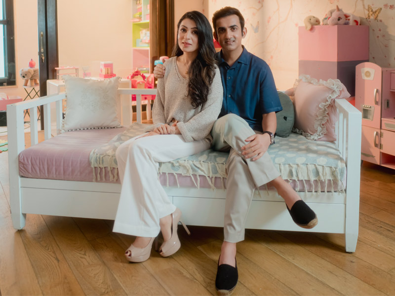 Family in pink playroom – Beautiful Homes