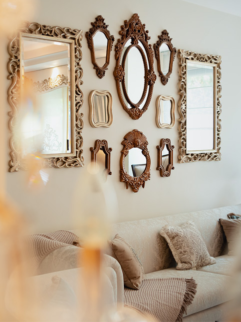 Living room with decorative mirrors – Beautiful Homes