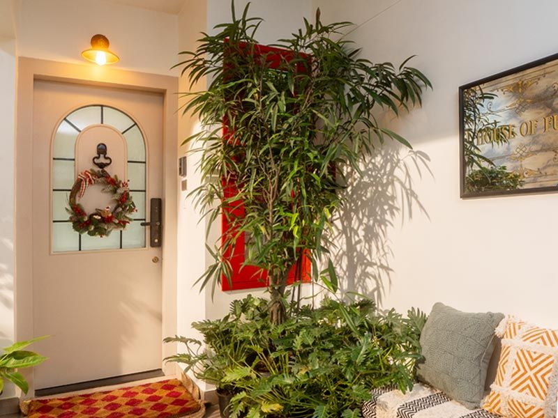 Entrance with “House of Fun” nameplate – Beautiful Homes