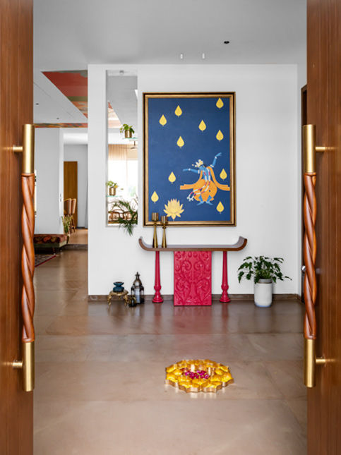 Foyer with custom console and staircase cut-out – Beautiful Homes