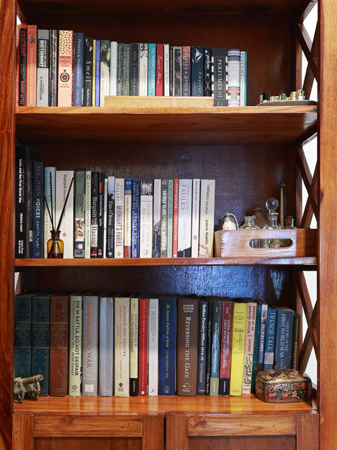Open bookshelves requiring dusting – Beautiful Homes