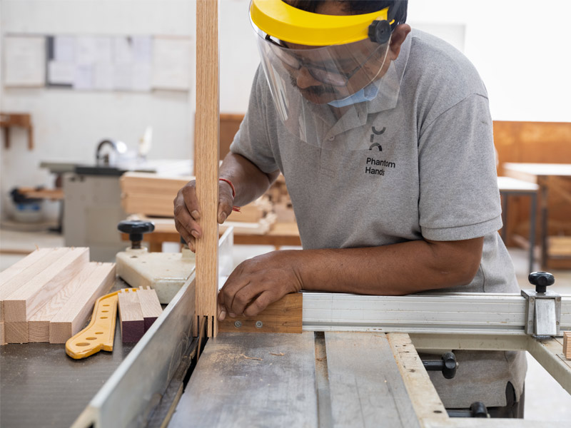Carpenter Achinthya mills Phantom Hands’ signature finger joints using a circular saw – Beautiful Homes