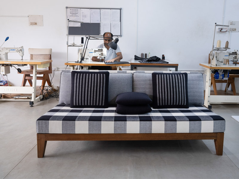 The No. 11 Sofa from the Geoffrey Bawa Collection—upholstered in the collection’s signature black-and-white checks – Beautiful Homes