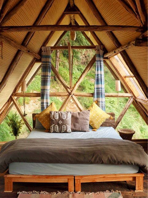 Inside a NORTH-built cabin, dhajji’s timber lattice meets contemporary warmth. Light slips between wood grain and thick walls – Beautiful Homes