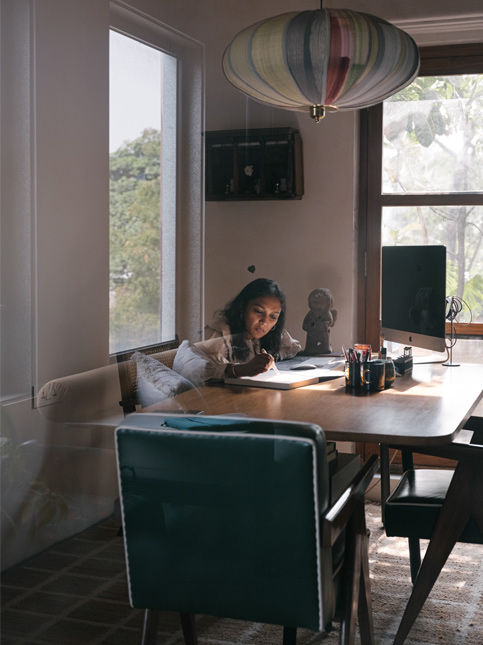 Workspace with materials and reference books – Beautiful Homes