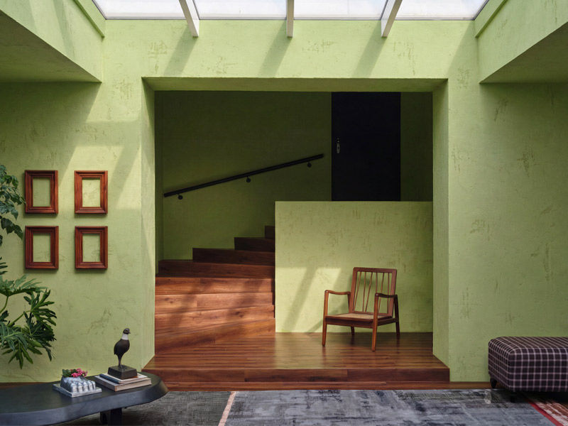 Moonlit Silk room with natural light, chair, side table, and carpet – Beautiful Homes