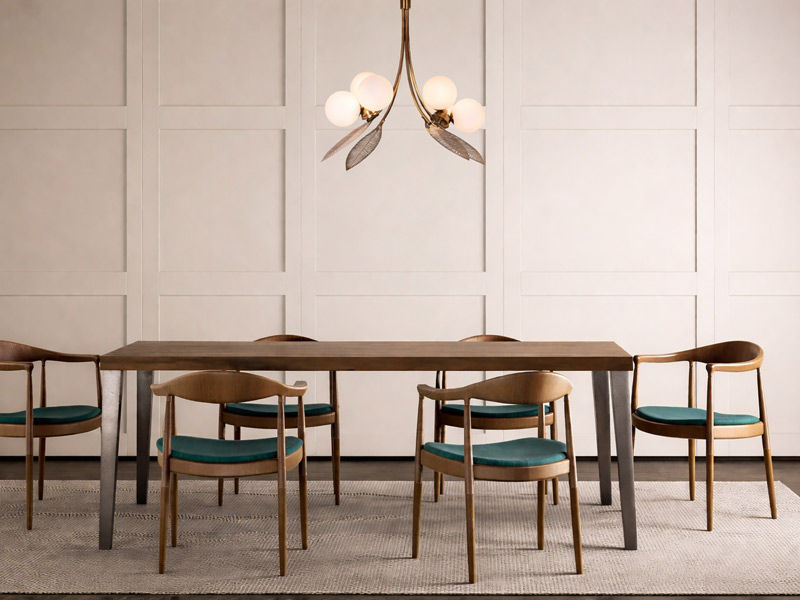 Modern gold chandelier over dining table – Beautiful Homes