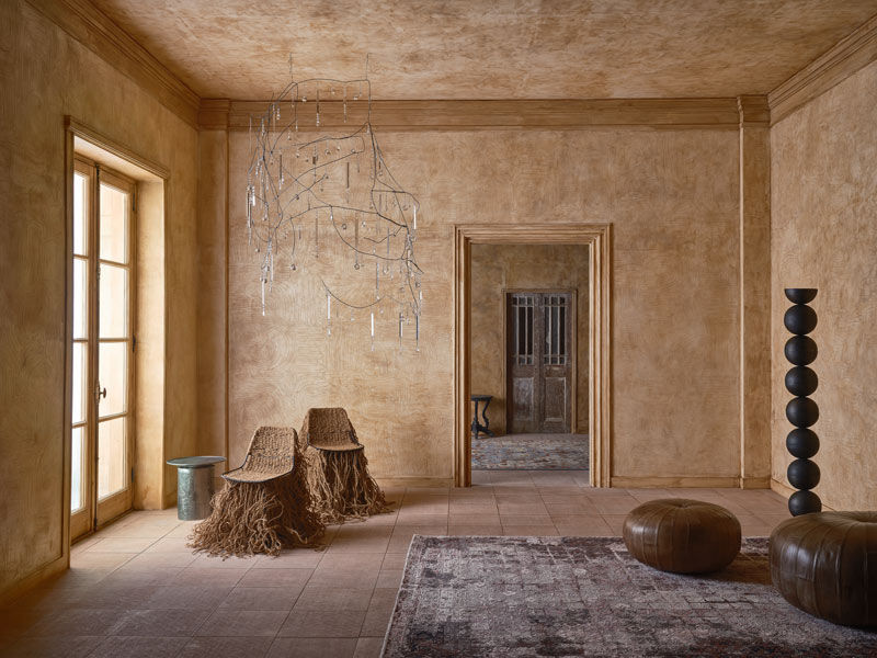 Materials feel elemental and rooted—stone, wool, felt, raw silk, clay, leather—selected for their durability, cultural resonance, and relationship to land – Beautiful Homes