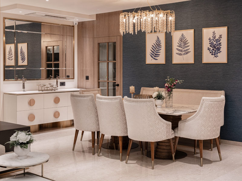 Elegant dining room with crystal chandelier and upholstered chairs – Beautiful Homes