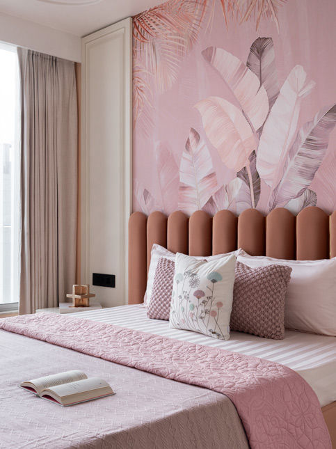 Pink bedroom with botanical wallpaper and upholstered headboard – Beautiful Homes