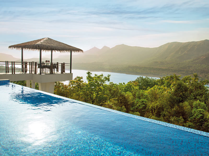 Overlooking Mulshi Lake, Atmantan’s infinity pool and meditation pagoda create a dramatic setting– Beautiful Homes