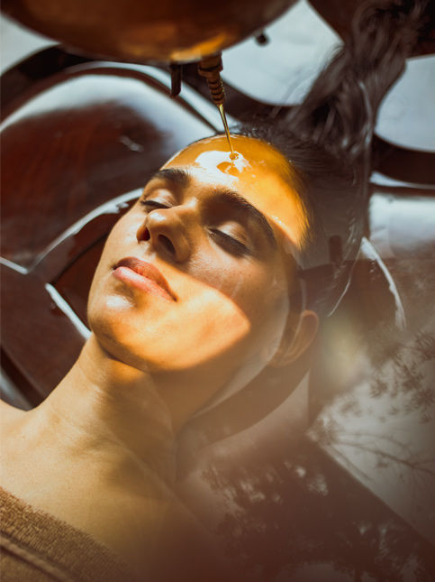 traditional therapies like Shirodhara draw from ancient Ayurvedic wisdom to restore balance and calm – Beautiful Homes