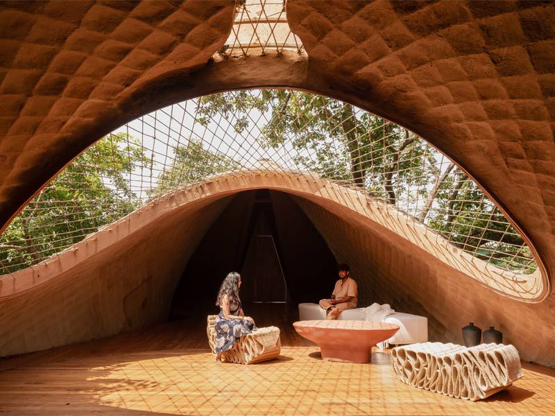 Curved earth architecture lounge interior – Beautiful Homes
