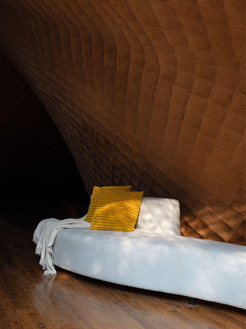 Sculptural textured wall with modern sofa – Beautiful Homes