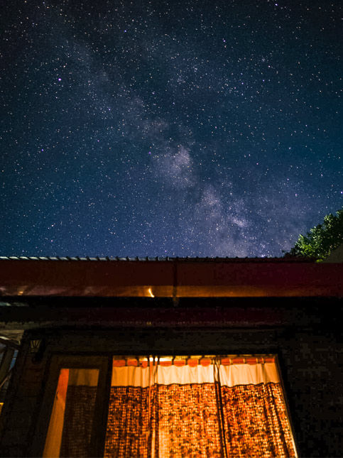 Starry night above cozy cabin – Beautiful Homes