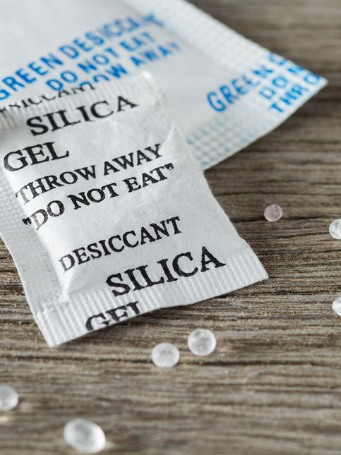 Silica gel desiccant moisture absorber packets on wooden surface – Beautiful Homes