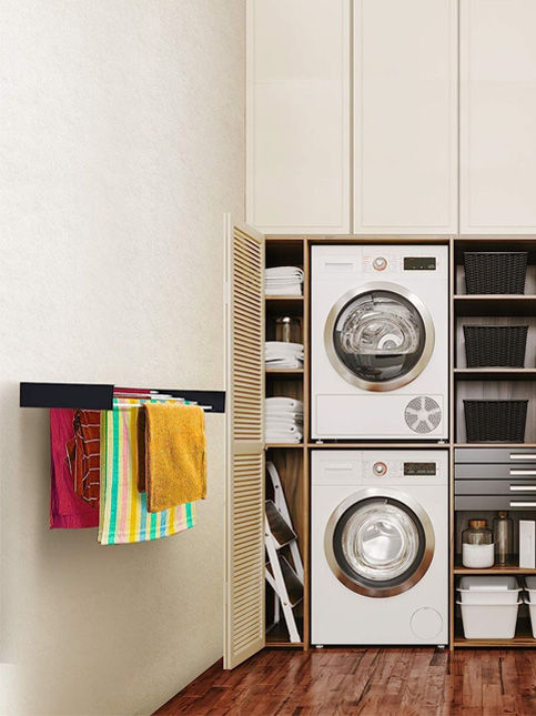 A wall-mounted drying rack with a collapsible design installed for additional drying space – Beautiful Homes