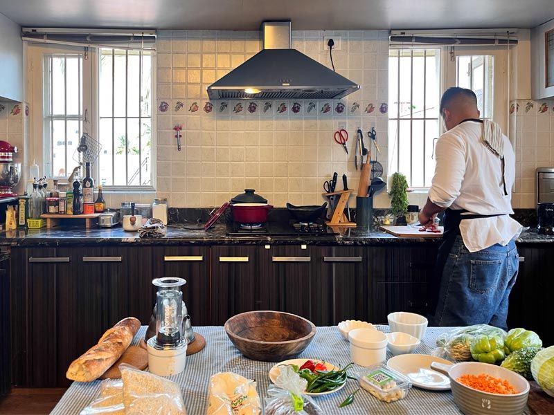 Chef preparing meal in modern kitchen – Beautiful Homes