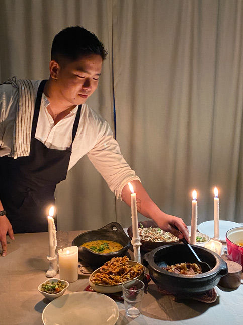 Chef serving candlelight dinner – Beautiful Homes