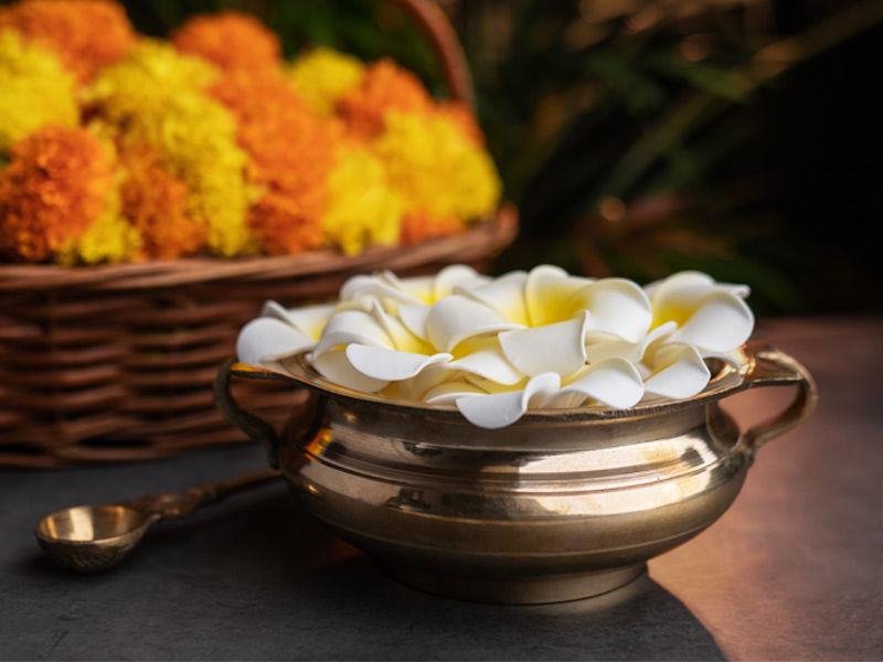 Frangipani flowers with marigold basket – Beautiful Homes