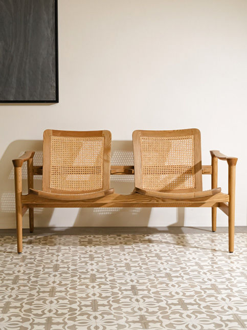 Elegant wooden two-seater bench with wicker backrest – Beautiful Homes