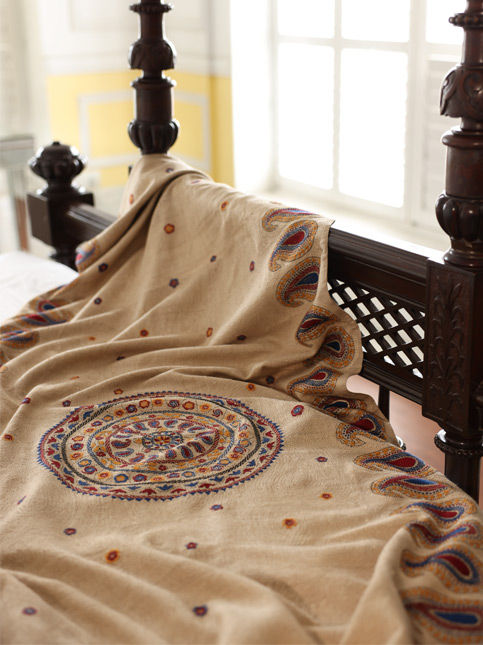 Embroidered shawl draped on wooden four-poster bed – Beautiful Homes